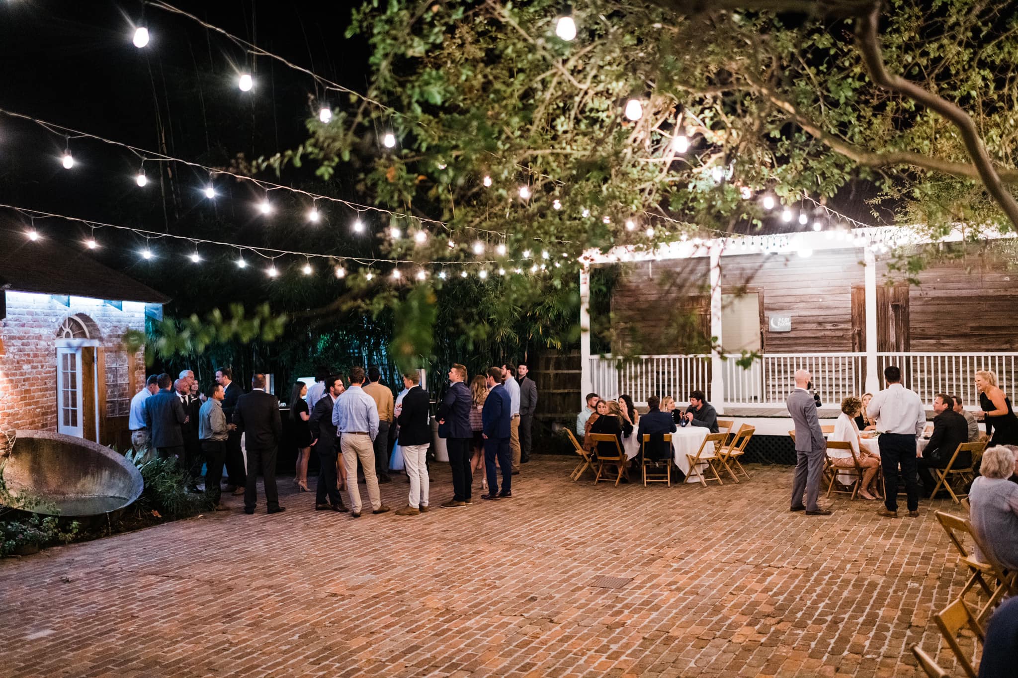 Breathtaking courtyard with greenery and floral arrangements for a wedding